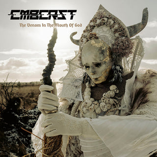 the album cover for Combichrist - The Venom in the Mouth of God