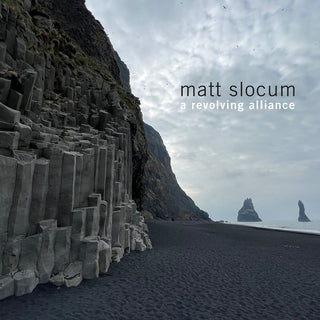 the album cover for Matt Slocum - Revolving Alliance