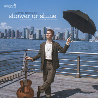 the album cover for David Rourke - Shower Or Shine