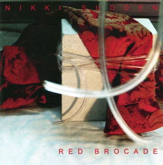the album cover for Nikki Sudden - Red Brocade