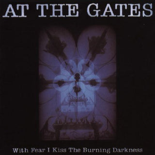 the album cover for At The Gates - With Fear I Kiss the Burning Darkness