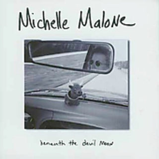 the album cover for Michelle Malone - Beneath The Devil's Moon [Import]