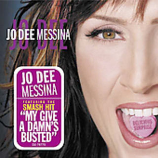 the album cover for Jo Dee Messina - Delicious Surprise