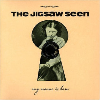 the album cover for Jigsaw Seen - My Name Is Tom