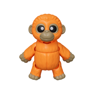 Orange toy monkey figure on a white background