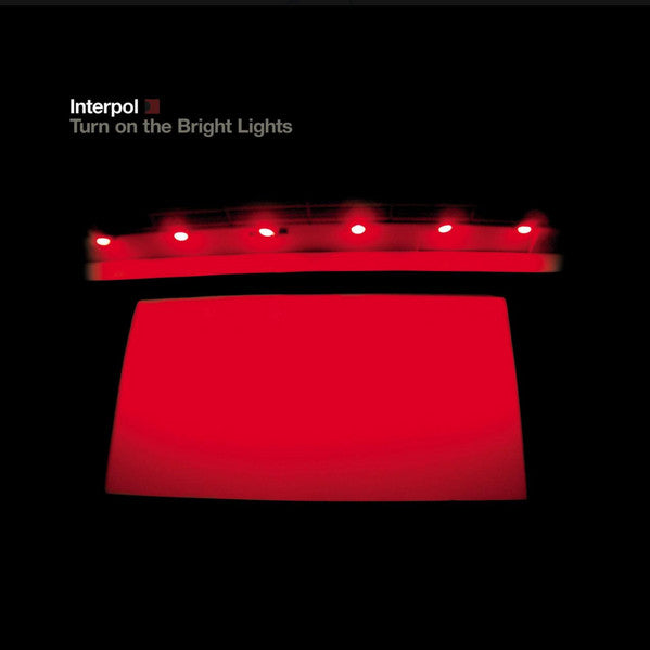 Interpol- Turn On The Bright Lights (Red w/Black Splatter)