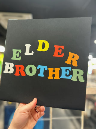 Elder Brother- I Won't Fade On You (Easter Yellow/Cyan Blue w/ Heavy Black Splatter)(Screen Print Alt Cover, Numbered)