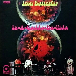 Iron Butterfly- In-A-Gadda-Da-Vida (Smoked Clear W/ Green & Purple Splatter)(Right Corner Of Sleeve Creased)