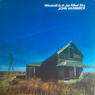 John Hambrick- Windmill In A Jet Filled Sky (Corner Clipped)