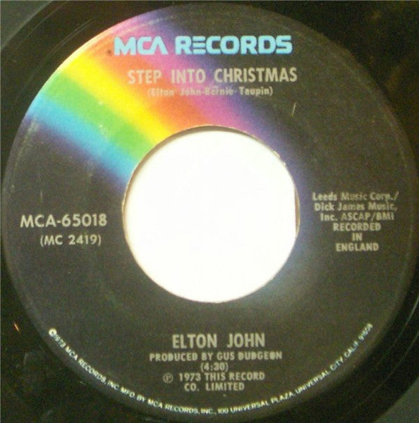 Elton John- Step Into Christmas/HO HO HO (Who'd Be A Turkey At Christmas)